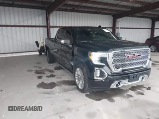 2019 GMC Sierra 1500 Denali z VIN 1GTU9FEL1KZ262413, wystawiony jako IAAI lot #41843078 z przebiegiem 60 744 mil mil oraz . Historia ofert i sprzedaży dostępna na DreamBid. Obrazek 1.