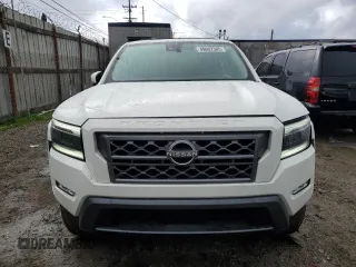 2023 Nissan Frontier SV z VIN 1N6ED1EJ8PN669001, wystawiony jako Copart lot #57530255 z przebiegiem 2 718 mil mil oraz Szkoda całkowita • Salvage title. Historia ofert i sprzedaży dostępna na DreamBid. Obrazek 5.