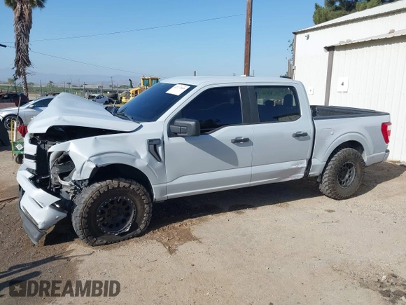 2021 Ford F-150 XL with VIN 1FTEW1CP5MKD48227, listed as a IAAI auction lot 42272809 with 87,614 mi miles and . Bid and sale history available at DreamBid. Image 14.