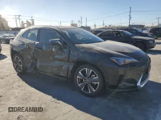 2024 Lexus UX with VIN JTHX6JBH4R2192156, listed as a Copart auction lot 84512994 with 3,320 mi miles and Salvage Title. Bid and sale history available at carsss.com. Image 4.