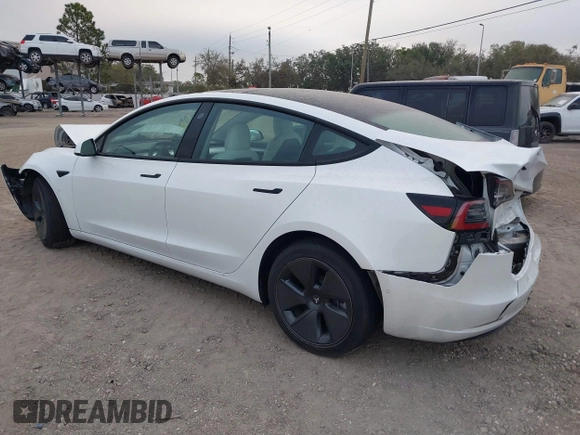 2022 Tesla Model 3 Long Range z VIN 5YJ3E1EB9NF115364, wystawiony jako IAAI lot #41618947 z przebiegiem 58 196 mil mil oraz . Historia ofert i sprzedaży dostępna na DreamBid. Obrazek 3.