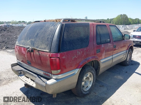 2000 GMC Jimmy SL with VIN 1GKCS13W9Y2264710, listed as a IAAI auction lot 42136082 with 206,584 mi miles. Bid and sale history available at carsss.com. Image 17.