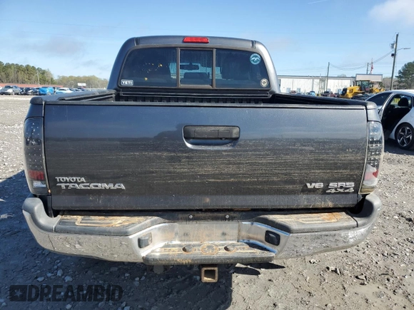 2013 Toyota Tacoma z VIN 3TMLU4EN0DM129808, wystawiony jako Copart lot #50353125 z przebiegiem 231 750 mil mil oraz Szkoda całkowita • Salvage title. Historia ofert i sprzedaży dostępna na DreamBid. Obrazek 6.