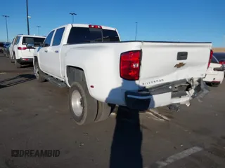 2018 Chevrolet Silverado 3500HD High Country with VIN 1GC4K1EY6JF207068, listed as a IAAI auction lot 41288394 with 110,158 mi miles and . Bid and sale history available at DreamBid. Image 3.