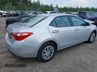 2018 Toyota Corolla L with VIN 2T1BURHE7JC038172, listed as a IAAI auction lot 42473864 with 83,657 mi miles and . Bid and sale history available at DreamBid. Image 4.
