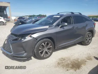 2020 Lexus RX 350 с VIN 2T2HZMAA5LC162669, выставлен на аукционе Copart как лот 60208215 с пробегом 73 609 миль миль и Списание • Salvage title. История ставок и продаж доступна на DreamBid. Изображение 1.
