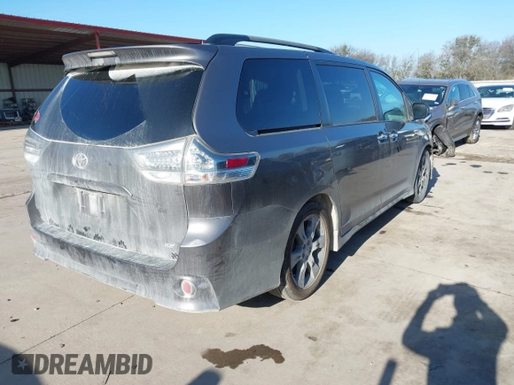 2014 Toyota Sienna SE with VIN 5TDXK3DC7ES482954, listed as a IAAI auction lot 41197465 with 160,107 mi miles and . Bid and sale history available at DreamBid. Image 4.