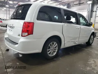 2014 Dodge Grand Caravan SXT with VIN 2C4RDGCG6ER427435, listed as a Copart auction lot 51957355 with 106,078 mi miles and Salvage Title. Bid and sale history available at DreamBid. Image 3.