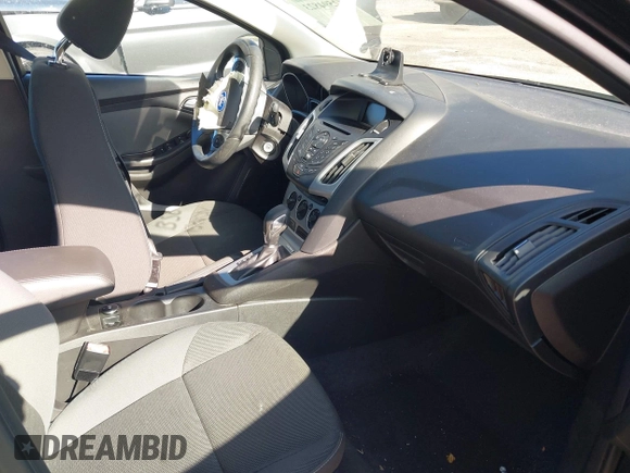 2012 Ford Focus SE with VIN 1FAHP3F22CL150631, listed as a IAAI auction lot 42594823 with 49,456 mi miles and . Bid and sale history available at DreamBid. Image 5.