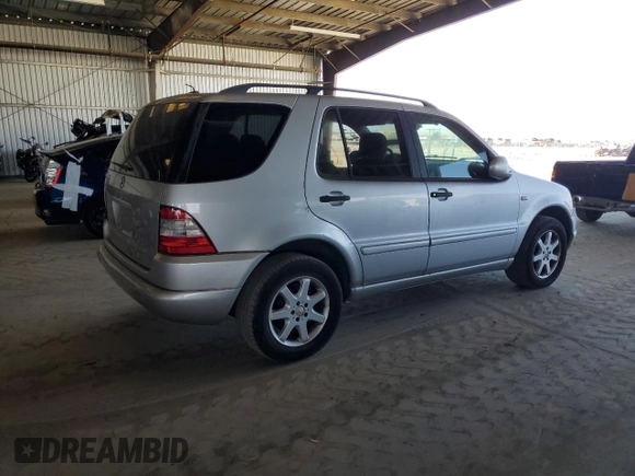 2001 Mercedes-Benz M 320/430/500 with VIN 4JGAB72E61A260183, listed as a Copart auction lot 58892655 with 71,651 mi miles and Clean title. Bid and sale history available at DreamBid. Image 3.