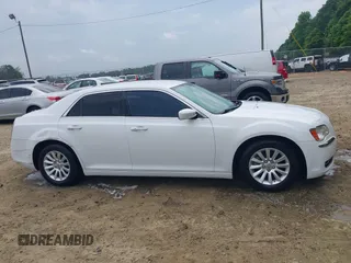 2014 Chrysler 300 z VIN 2C3CCAAG0EH376548, wystawiony jako IAAI lot #42288324 z przebiegiem 158 089 mil mil oraz . Historia ofert i sprzedaży dostępna na DreamBid. Obrazek 13.