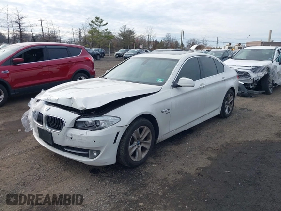 2012 BMW 5 Series 528i xDrive with VIN WBAXH5C53CDW10660, listed as a IAAI auction lot 41016708 with 157,757 mi miles and . Bid and sale history available at carsss.com. Image 2.
