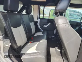 2016 Jeep Wrangler Unlimited Sahara with VIN 1C4BJWEG6GL168944, listed as a Copart auction lot 61650615 with 66,016 mi miles and Salvage title. Bid and sale history available at DreamBid. Image 10.