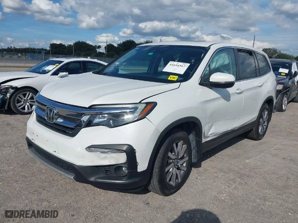 2021 Honda Pilot EX-L with VIN 5FNYF5H55MB039589, listed as a IAAI auction lot 41694567 with 58,685 mi miles. Bid and sale history available at carsss.com. Image 6.