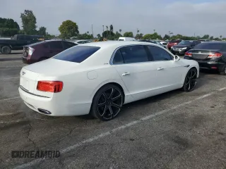 2015 Bentley Flying Spur z VIN SCBEC9ZAXFC041601, wystawiony jako Copart lot #62028895 z przebiegiem 43 943 mil mil oraz Szkoda całkowita • Salvage title. Historia ofert i sprzedaży dostępna na DreamBid. Obrazek 3.