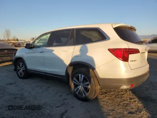 2017 Honda Pilot EX-L with VIN 5FNYF6H59HB032608, listed as a Copart auction lot 42244755 with 151,564 mi miles and Salvage Title. Bid and sale history available at DreamBid. Image 2.