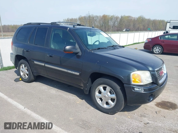2005 GMC Envoy SLE with VIN 1GKDT13S052299632, listed as a IAAI auction lot 41966628 with 199,312 mi miles and . Bid and sale history available at DreamBid. Image 1.
