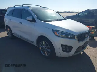 2016 Kia Sorento SX z VIN 5XYPKDA51GG146714, wystawiony jako IAAI lot #42518142 z przebiegiem 137 904 mil mil oraz . Historia ofert i sprzedaży dostępna na DreamBid. Obrazek 1.