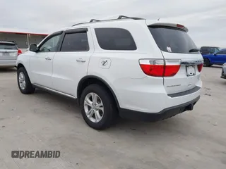 2013 Dodge Durango Crew with VIN 1C4RDHDG5DC617061, listed as a IAAI auction lot 41385801 with 142,304 mi miles. Bid and sale history available at carsss.com. Image 3.