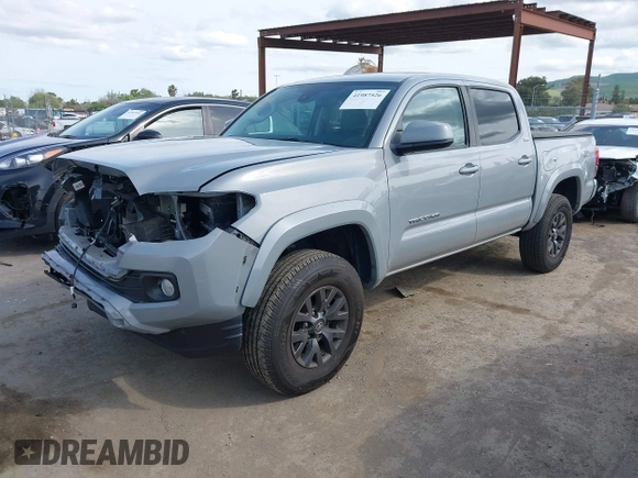 2020 Toyota Tacoma SR5 with VIN 5TFAZ5CN6LX089275, listed as a IAAI auction lot 41987526 with 51,661 mi miles and . Bid and sale history available at DreamBid. Image 2.