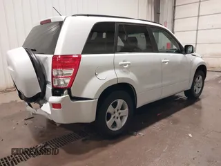 2006 Suzuki Grand Vitara Premium with VIN JS3TD943664100584, listed as a IAAI auction lot 41453129 with 159,220 mi miles and . Bid and sale history available at DreamBid. Image 4.