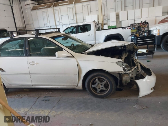 2004 Toyota Camry LE with VIN JTDBE32K540257588, listed as a IAAI auction lot 42208098 with 201,770 mi miles and . Bid and sale history available at DreamBid. Image 13.
