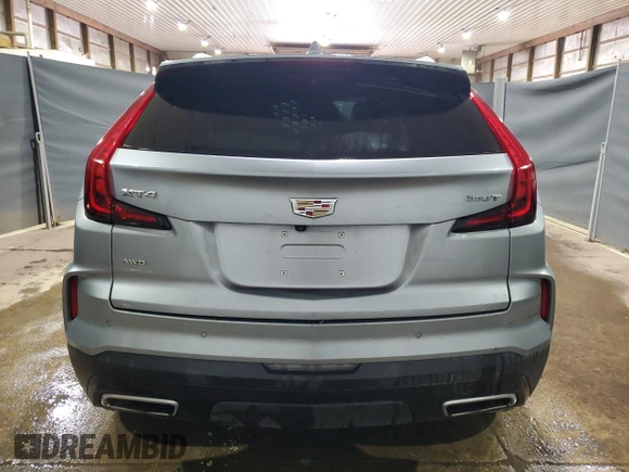 2024 Cadillac XT4 AWD Premium Luxury z VIN 1GYFZDR43RF148662, wystawiony jako Copart lot #65640385 z przebiegiem 38 267 mil mil oraz Czysty tytuł • Clean title. Historia ofert i sprzedaży dostępna na DreamBid. Obrazek 6.