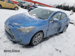 2016 Toyota Yaris z VIN 3MYDLBYV1GY126566, wystawiony jako Copart lot #83144034 z przebiegiem 84 665 mil mil oraz Szkoda całkowita • Salvage title. Historia ofert i sprzedaży dostępna na DreamBid. Obrazek 1.