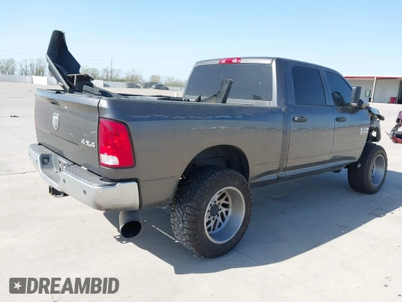 2014 Ram 2500 Tradesman with VIN 3C6UR5CL8EG321112, listed as a IAAI auction lot 41791292 with 225,673 mi miles and . Bid and sale history available at DreamBid. Image 4.