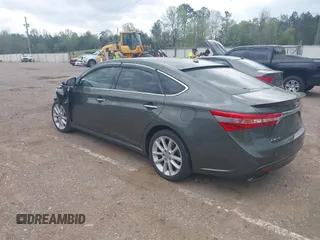 2013 Toyota Avalon XLE with VIN 4T1BK1EBXDU067394, listed as a IAAI auction lot 41944775 with 146,216 mi miles and . Bid and sale history available at DreamBid. Image 3.