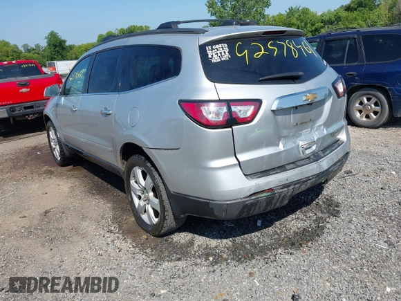 2016 Chevrolet Traverse LT with VIN 1GNKRGKD3GJ275039, listed as a IAAI auction lot 42578461 with 131,843 mi miles and . Bid and sale history available at DreamBid. Image 3.