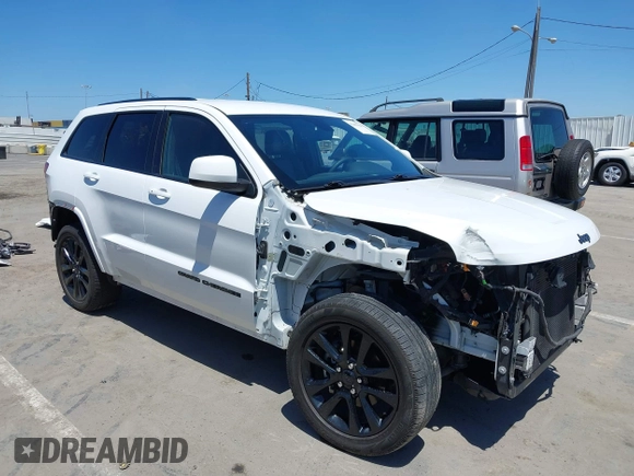 2018 Jeep Grand Cherokee Altitude with VIN 1C4RJEAG2JC404009, listed as a IAAI auction lot 42691304 with 60,948 mi miles and . Bid and sale history available at DreamBid. Image 1.