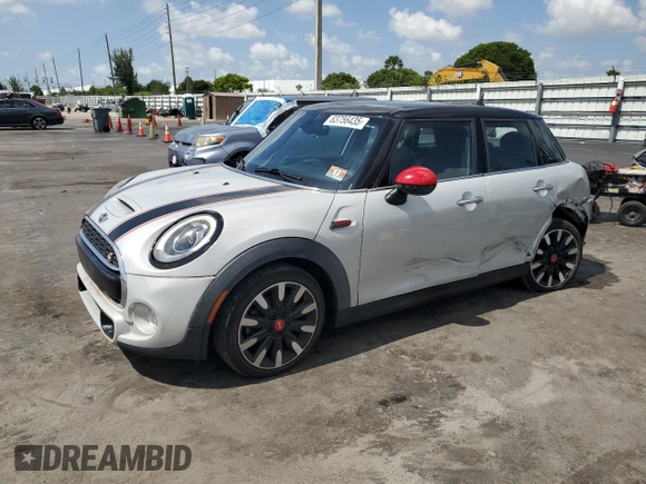 2017 MINI Hardtop 4 Door Cooper S with VIN WMWXU3C55H2D33015, listed as a Copart auction lot 63756435 with 63,596 mi miles and Salvage title. Bid and sale history available at DreamBid. Image 1.
