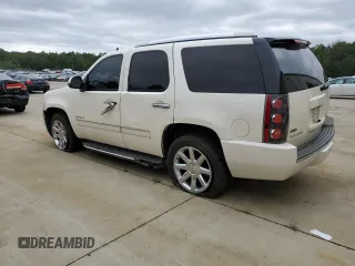 2010 GMC Yukon Denali with VIN 1GKUCEEF2AR119463, listed as a Copart auction lot 71236674 with 233,731 mi miles and Salvage Title. Bid and sale history available at carsss.com. Image 2.