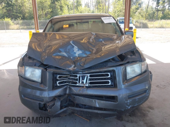 2007 Honda Ridgeline RTL with VIN 2HJYK16537H529904, listed as a IAAI auction lot 42626859 with 294,953 mi miles and . Bid and sale history available at DreamBid. Image 12.