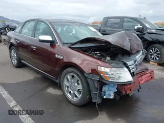 2009 Ford Taurus Limited z VIN 1FAHP25W59G115291, wystawiony jako IAAI lot #42195549 z przebiegiem 58 983 mil mil oraz . Historia ofert i sprzedaży dostępna na DreamBid. Obrazek 1.