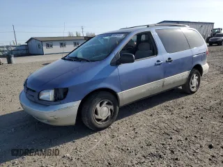 1998 Toyota Sienna LE with VIN 4T3ZF13CXWU011884, listed as a Copart auction lot 54601885 with 205,989 mi miles and Salvage Title. Bid and sale history available at carsss.com. Image 1.