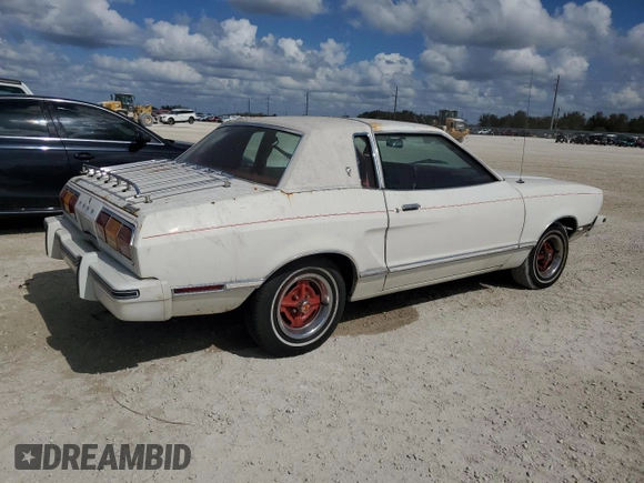 1977 Ford Mustang z VIN 7F04Z150204, wystawiony jako Copart lot #77276344 z przebiegiem 94 802 mil mil oraz Szkoda całkowita • Salvage title. Historia ofert i sprzedaży dostępna na DreamBid. Obrazek 3.