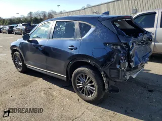 2021 Mazda CX-5 Touring with VIN JM3KFBCM1M1370592, listed as a Copart auction lot 87175264 with 81,193 mi miles and Salvage Title. Bid and sale history available at carsss.com. Image 2.