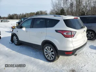2017 Ford Escape Titanium with VIN 1FMCU9J9XHUA01661, listed as a Copart auction lot 88345395 with 79,865 mi miles and Salvage Title. Bid and sale history available at carsss.com. Image 2.