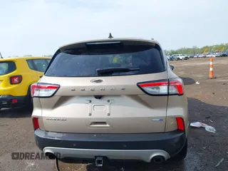 2020 Ford Escape Titanium z VIN 1FMCU9J92LUB48243, wystawiony jako IAAI lot #42143038 z przebiegiem 63 172 mil mil oraz . Historia ofert i sprzedaży dostępna na DreamBid. Obrazek 17.
