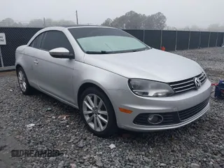 2012 Volkswagen Eos Komfort with VIN WVWBW7AH5CV007490, listed as a IAAI auction lot 41943292 with 142,598 mi miles and . Bid and sale history available at DreamBid. Image 1.
