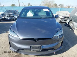 2023 Tesla Model X with VIN 7SAXCBE50PF378548, listed as a IAAI auction lot 41698357 with Not Provided miles and . Bid and sale history available at DreamBid. Image 12.