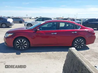 2018 Nissan Altima S with VIN 1N4AL3AP7JC268803, listed as a IAAI auction lot 41755005 with 114,215 mi miles and . Bid and sale history available at DreamBid. Image 14.
