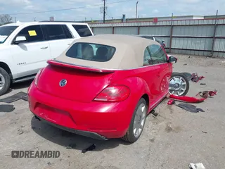 2015 Volkswagen Beetle 1.8T w/Tech with VIN 3VW517AT4FM803238, listed as a IAAI auction lot 41812373 with 42,369 mi miles and . Bid and sale history available at DreamBid. Image 4.