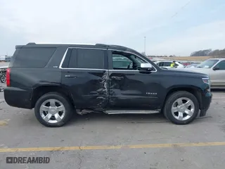 2016 Chevrolet Tahoe LTZ with VIN 1GNSKCKC9GR217166, listed as a IAAI auction lot 41152096 with 133,589 mi miles. Bid and sale history available at carsss.com. Image 13.
