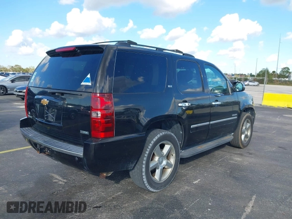 2012 Chevrolet Tahoe LTZ with VIN 1GNSKCE04CR218348, listed as a IAAI auction lot 41541342 with 96,365 mi miles and . Bid and sale history available at DreamBid. Image 4.