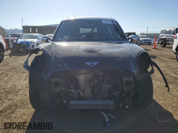 2016 MINI Countryman S with VIN WMWZC5C59GWU21416, listed as a Copart auction lot 57477455 with 119,868 mi miles and Salvage title. Bid and sale history available at DreamBid. Image 5.