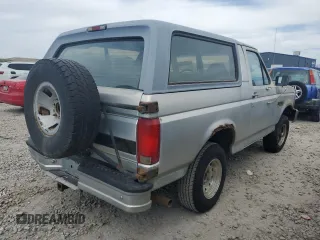 1996 Ford Bronco Custom with VIN 1FMEU15H2TLB39706, listed as a Copart auction lot 52936135 with 202,872 mi miles and Clean title. Bid and sale history available at DreamBid. Image 3.