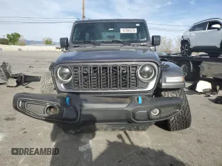 2024 Jeep Wrangler Sport S with VIN 1C4RJXN69RW147521, listed as a Copart auction lot 47298575 with 55,477 mi miles and Salvage Title. Bid and sale history available at DreamBid. Image 5.